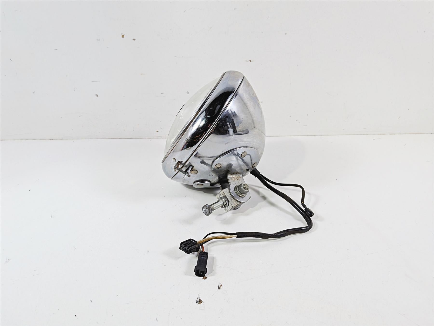 2012 Harley Softail FLSTF Fat Boy Headlight Head Light Lamp 7" 69748-05B {{ shop.shopifyCountryName }} - Mototech271