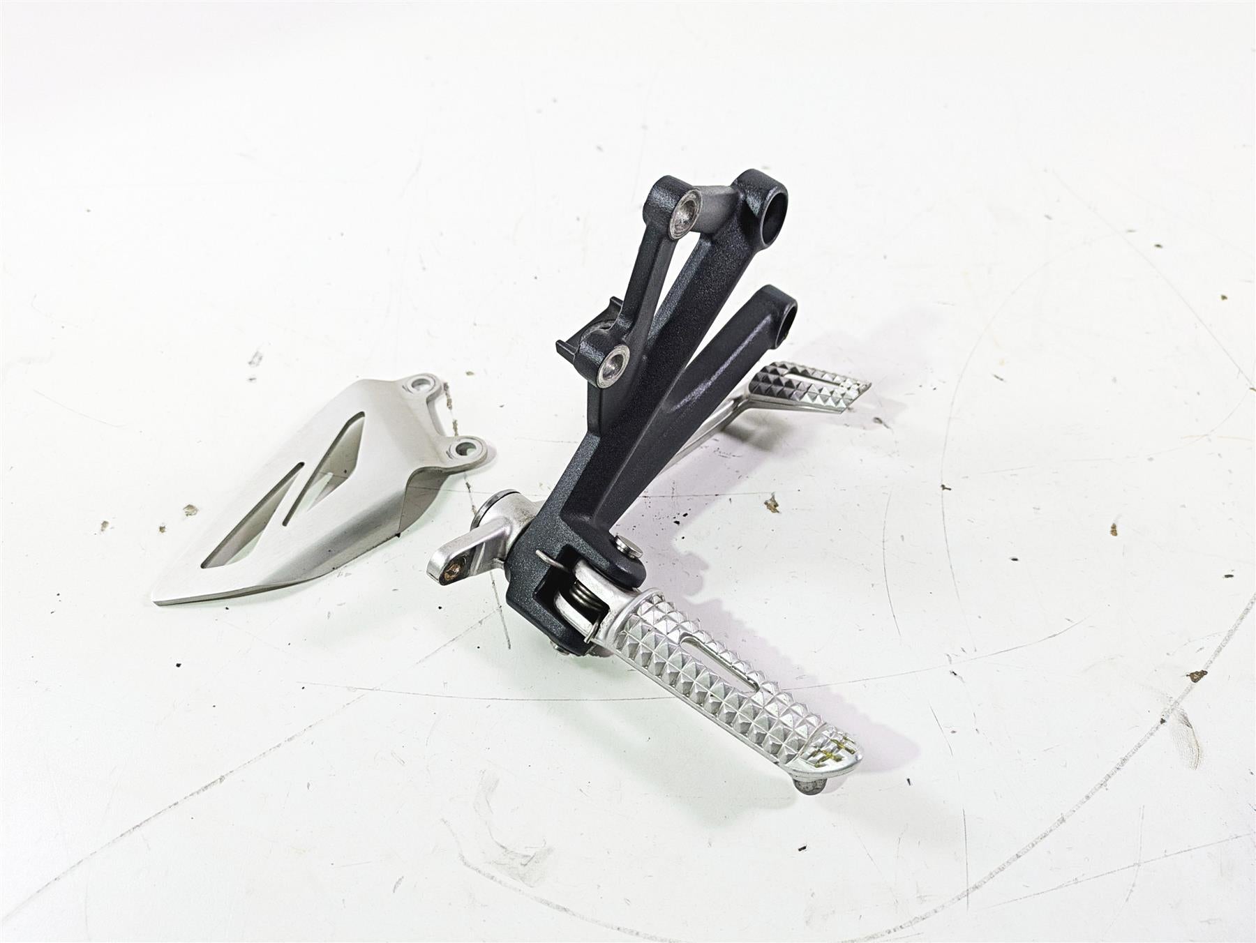 2012 Triumph Daytona 675 Right Rider Footpeg & Brake Pedal Set T2082056 T2082056 {{ shop.shopifyCountryName }} - Mototech271