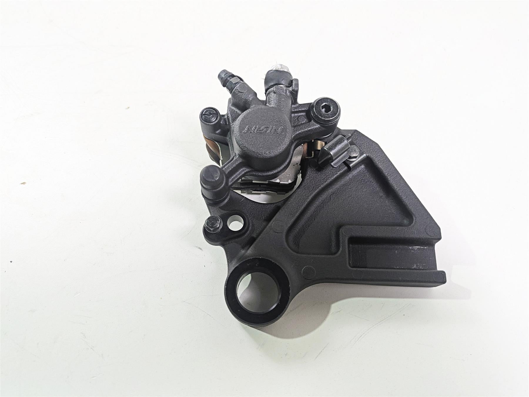 2024 Kawasaki ZX6R ZX636 Ninja Nissin Rear Brake Caliper & Bracket 43080-0242-DJ {{ shop.shopifyCountryName }} - Mototech271