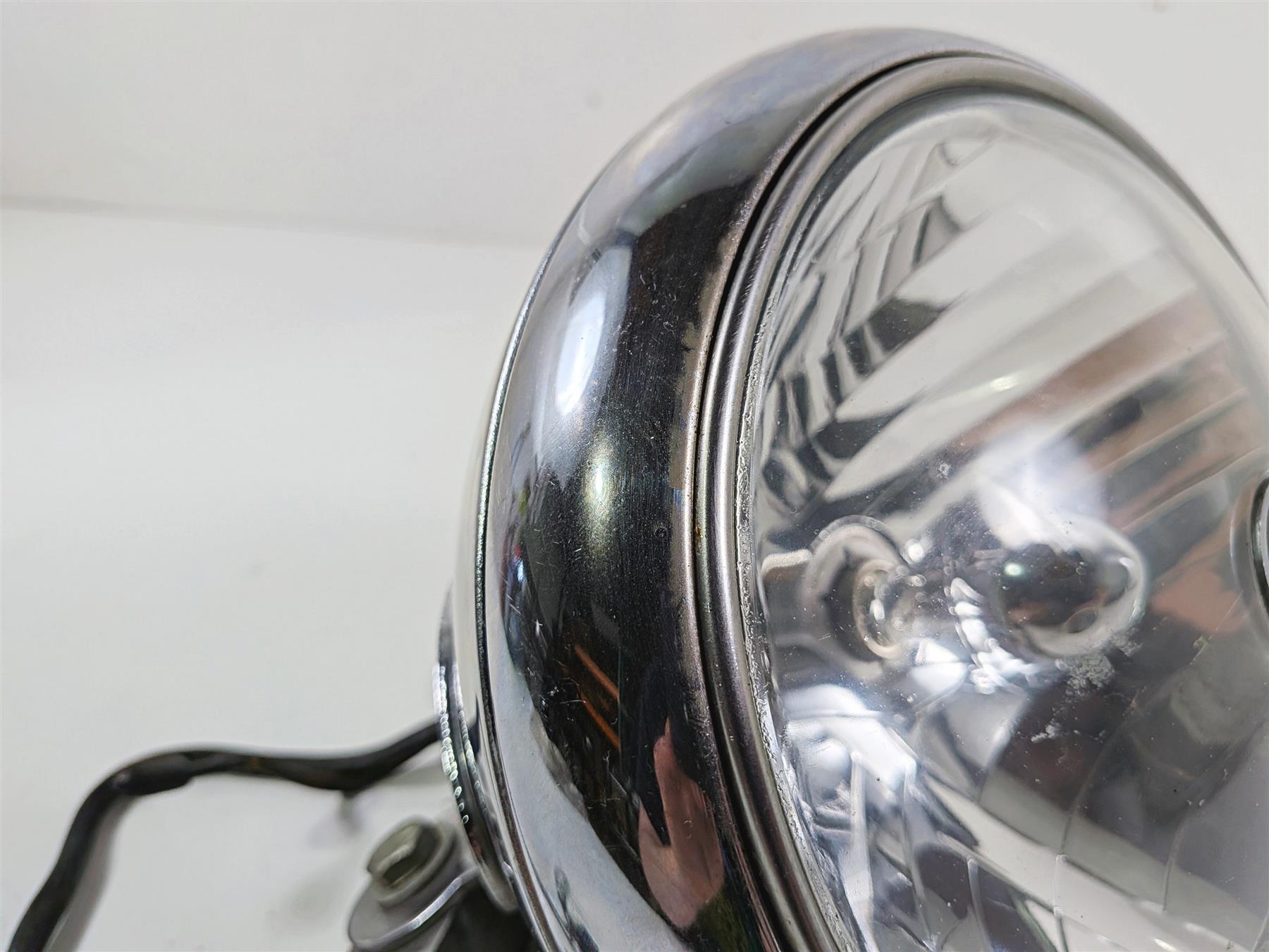 2012 Harley Softail FLSTF Fat Boy Headlight Head Light Lamp 7" 69748-05B {{ shop.shopifyCountryName }} - Mototech271
