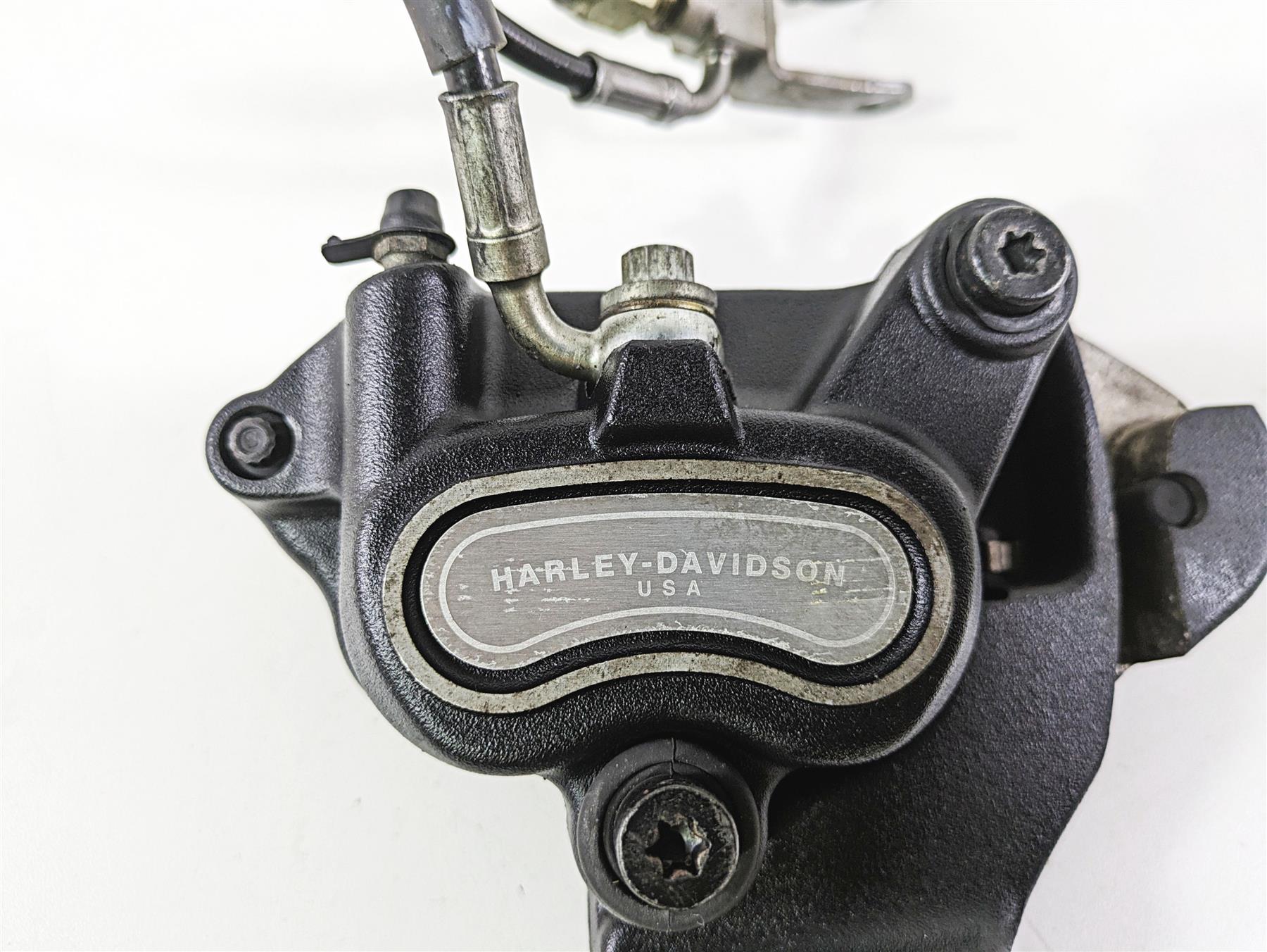 2008 Harley FLSTC Softail Heritage Rear Brake Caliper + Bracket & Line 40908-08 {{ shop.shopifyCountryName }} - Mototech271