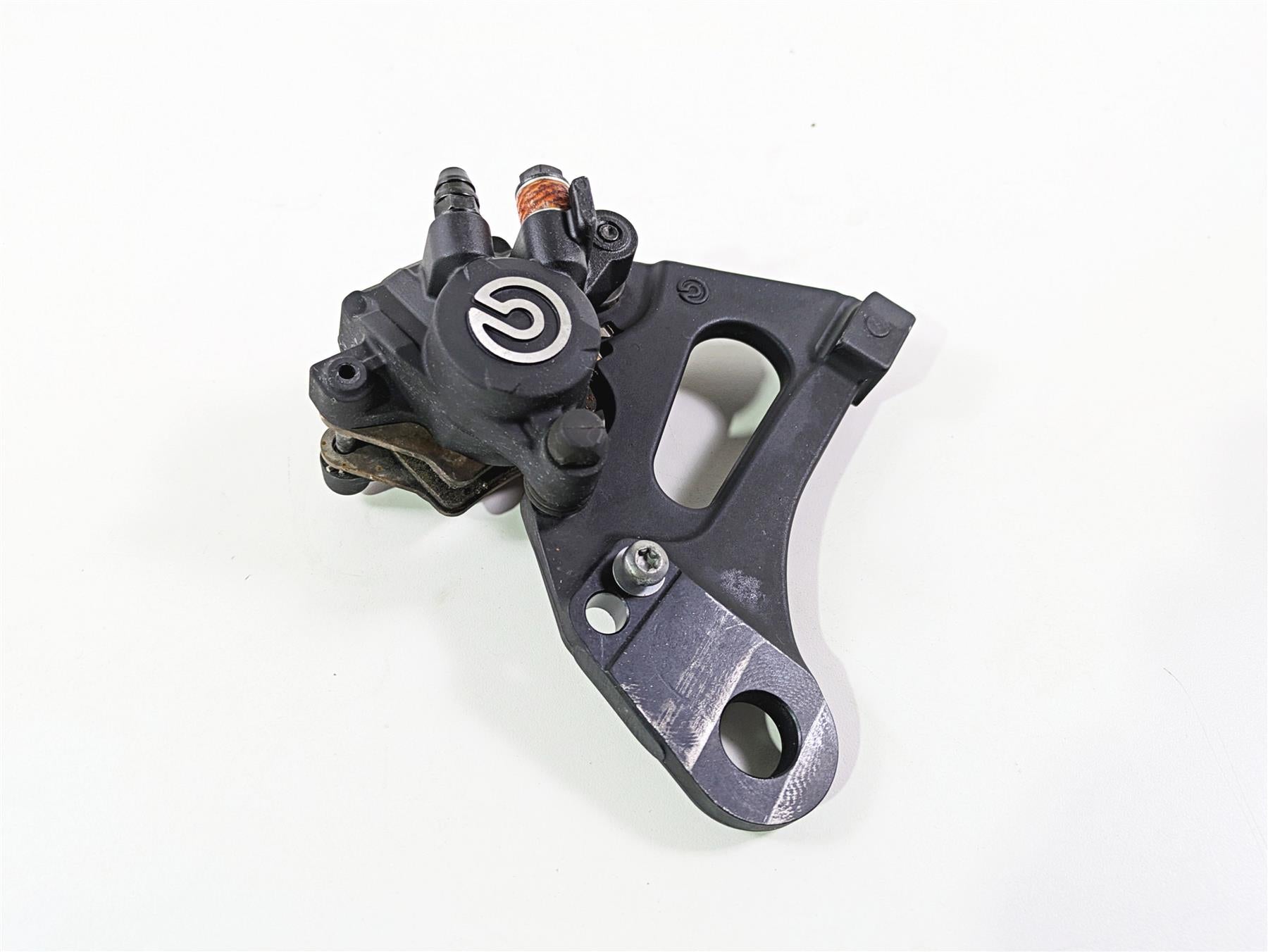 2024 Triumph Tiger 900 GT Brembo Rear Brake Caliper + Bracket T2022330 {{ shop.shopifyCountryName }} - Mototech271