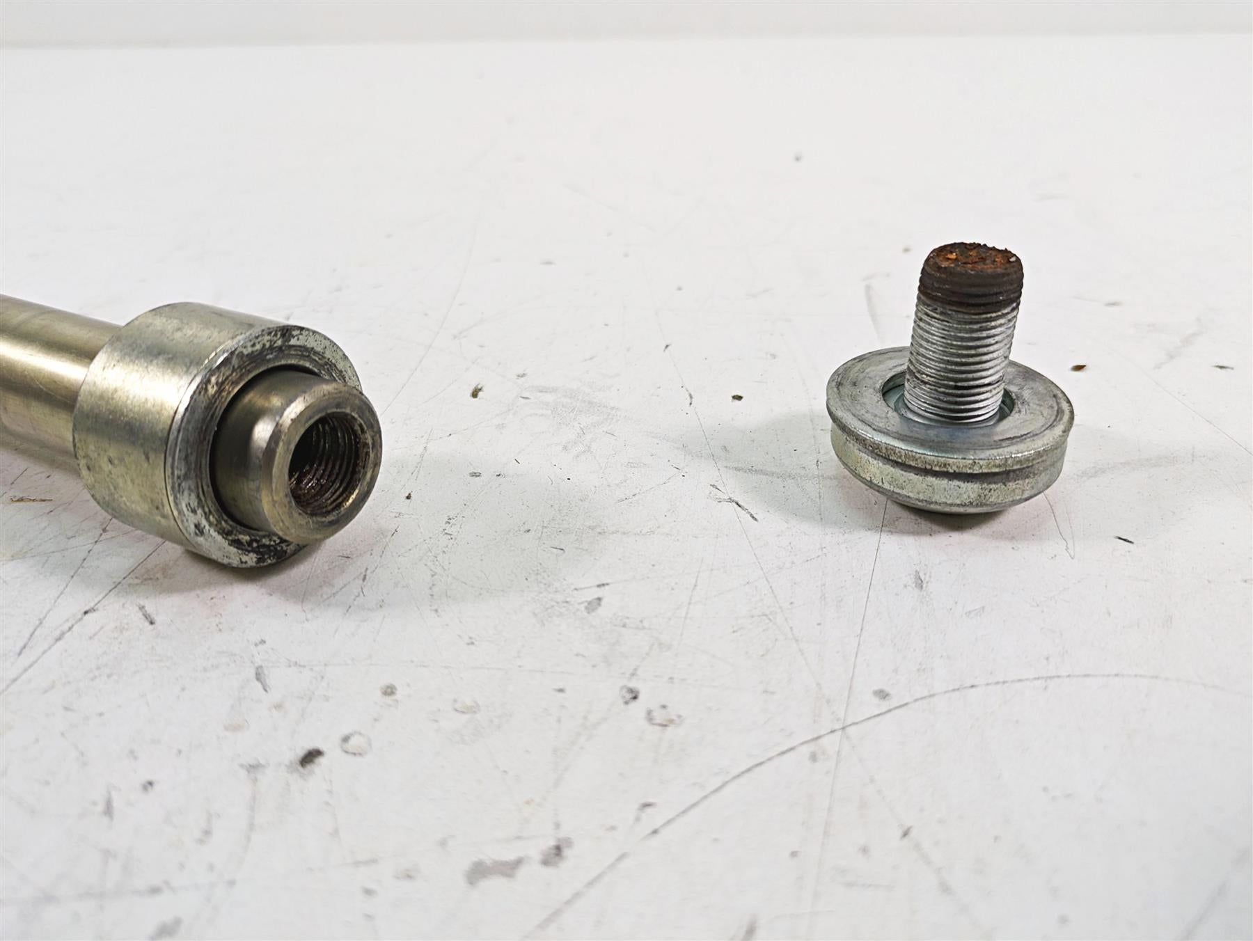 2009 Harley FXCWC Softail Rocker C Front Axle Wheel Spindle 25mm 41348-08 {{ shop.shopifyCountryName }} - Mototech271