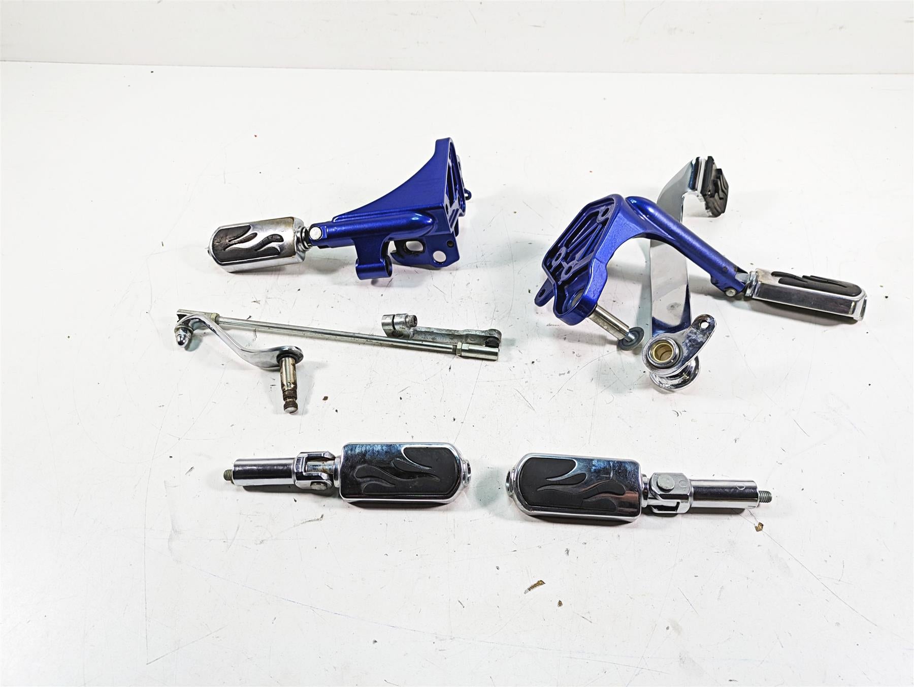 2009 Harley FXCWC Softail Rocker C Flame Foot Peg & Blue Brackets Set 33683-07A | Mototech271