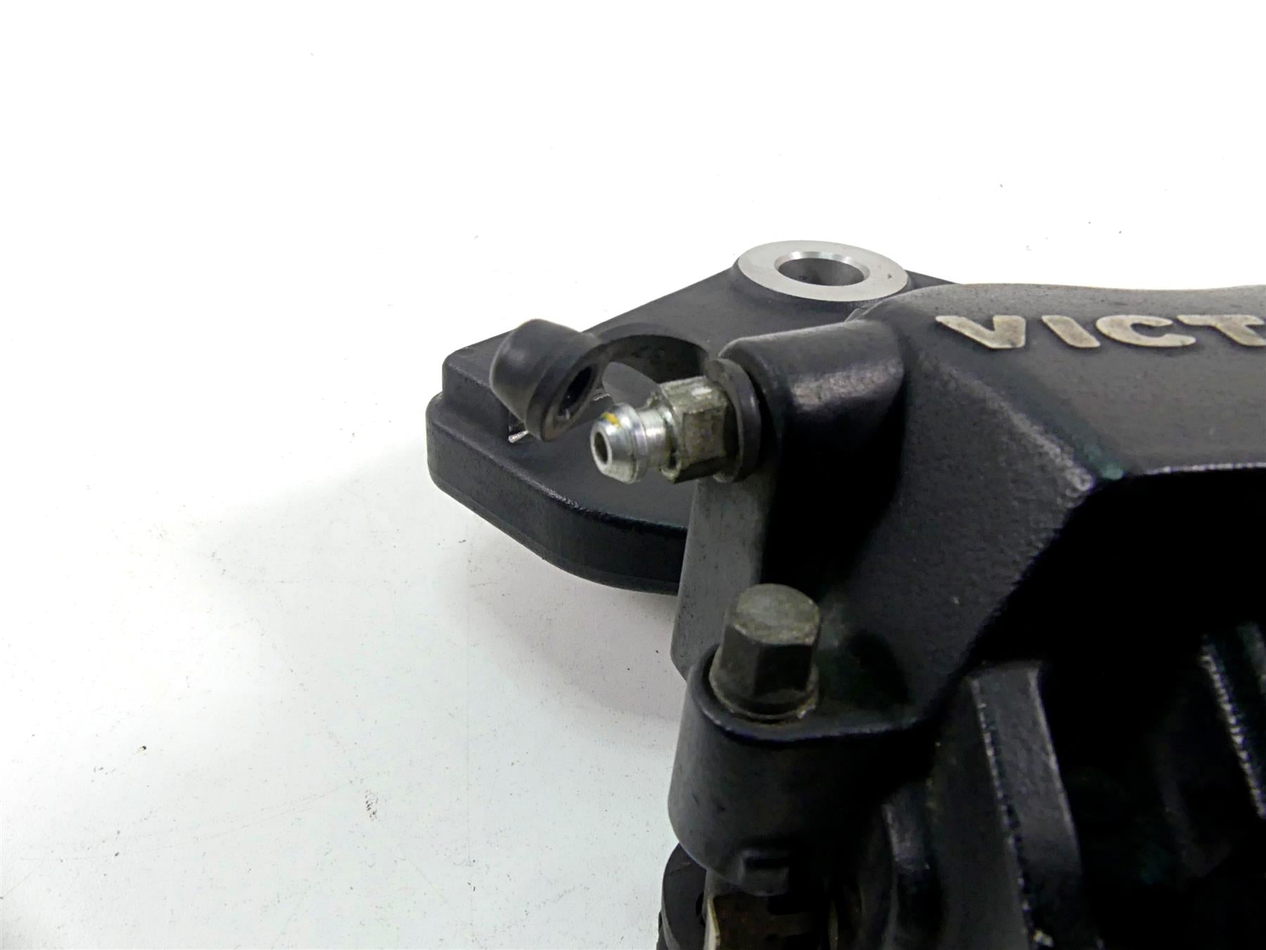 2011 Victory Cross Country Rear Brake Caliper & Bracket 1910926 {{ shop.shopifyCountryName }} - Mototech271