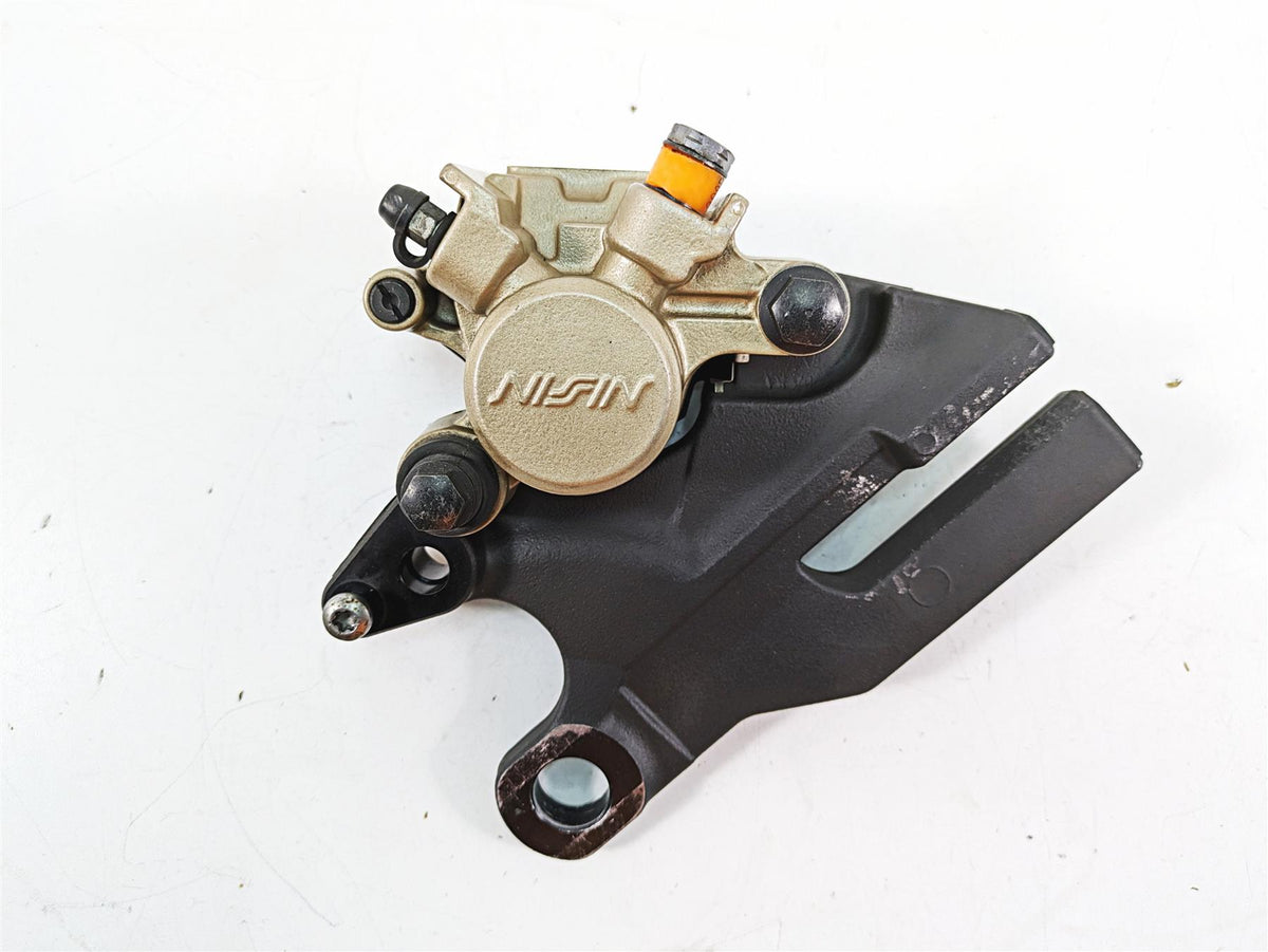 2012 Triumph Tiger 800XC ABS Rear Nissin Brake Caliper & Bracket T2025050 {{ shop.shopifyCountryName }} - Mototech271