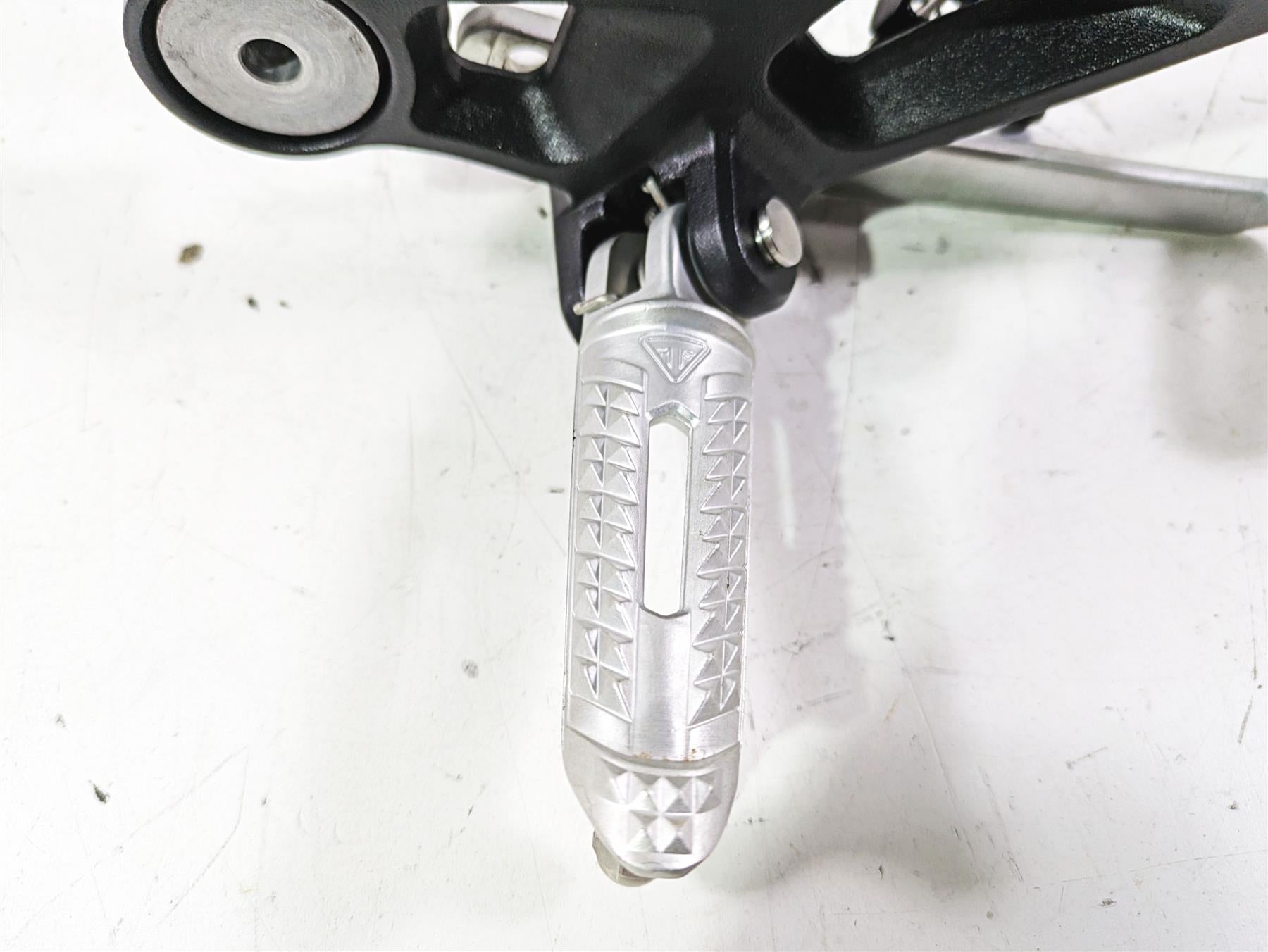2023 Triumph Street Triple 765 RS Right Rider Footpeg & Brake Pedal T2082484 {{ shop.shopifyCountryName }} - Mototech271