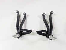 Load image into Gallery viewer, 2024 Triumph Street Triple 765 R Rear Passenger Footpeg Set T2088156 T2088157
