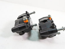 Load image into Gallery viewer, 2009 Harley Dyna FXDFSE CVO Fat Bob Front Brake Caliper Set 44046-08 44047-08
