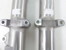 Load image into Gallery viewer, 2015 Harley FLS Softail Slim Lower Showa Fork Tube Leg Set 45917-08 45918-07 | Mototech271
