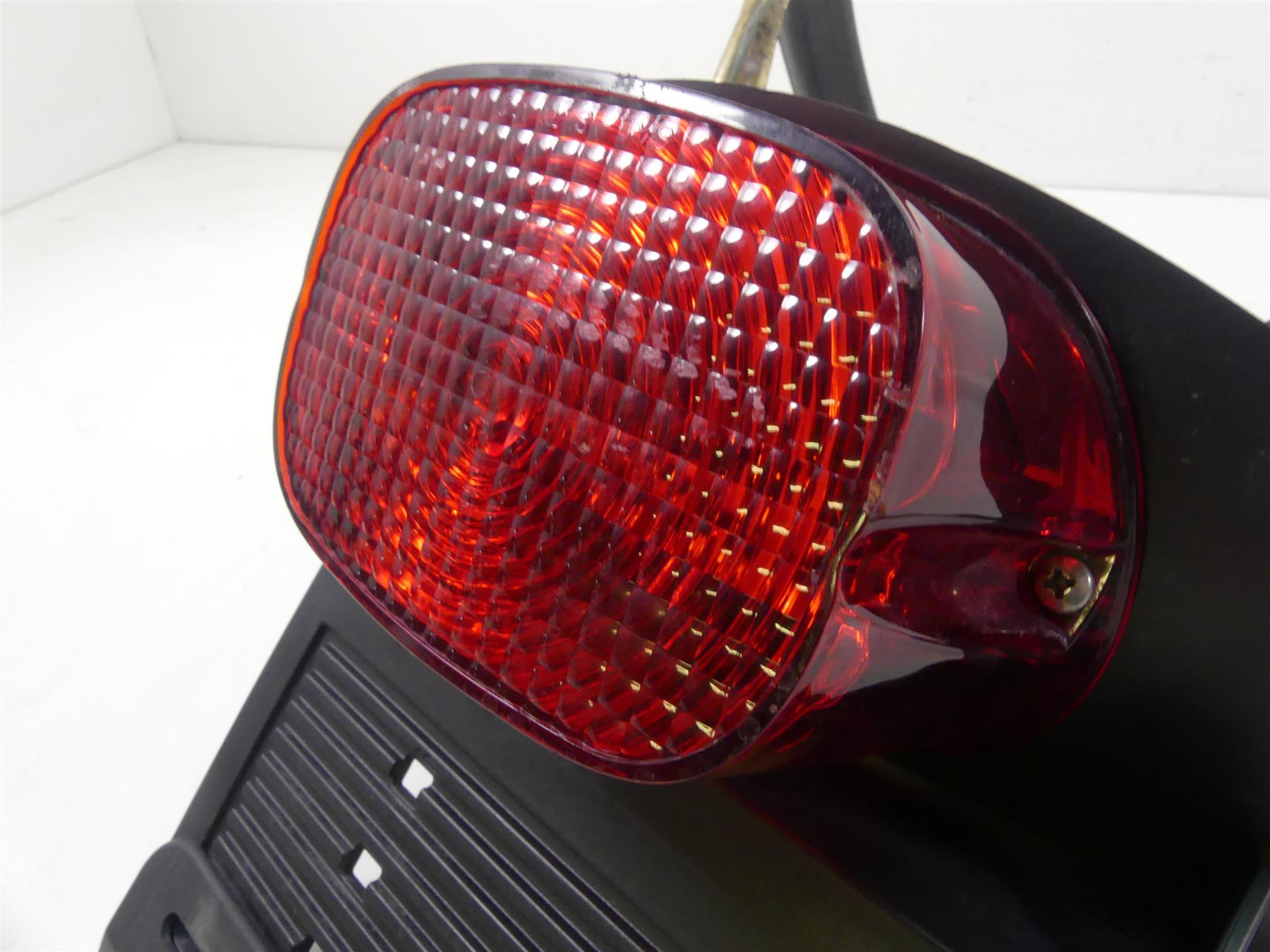 2009 Harley FXDF Dyna Fat Bob Taillight Tail Light & Plate Holder Set 60250-08A {{ shop.shopifyCountryName }} - Mototech271