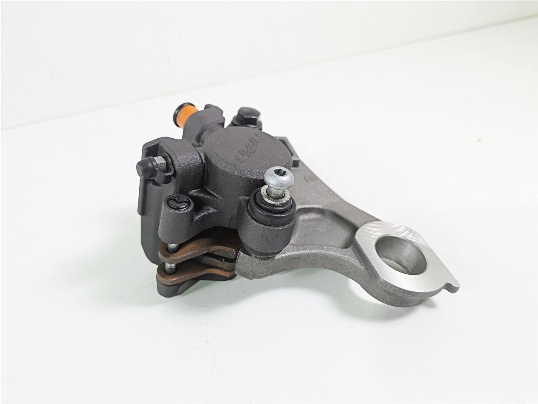 2014 Yamaha YZFR1 R1 RN22 Rear Brake Caliper & Bracket Nissin 5VY-2580W-12-00 {{ shop.shopifyCountryName }} - Mototech271