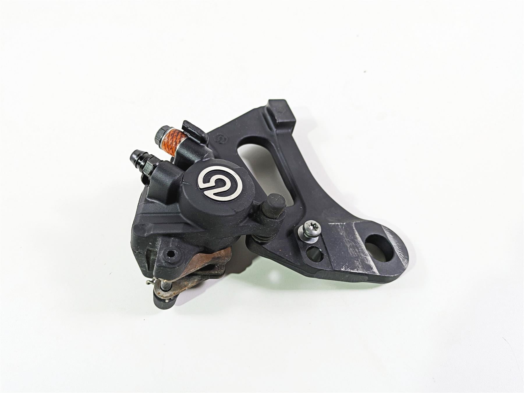 2024 Triumph Tiger 900 GT Brembo Rear Brake Caliper + Bracket T2022330 {{ shop.shopifyCountryName }} - Mototech271