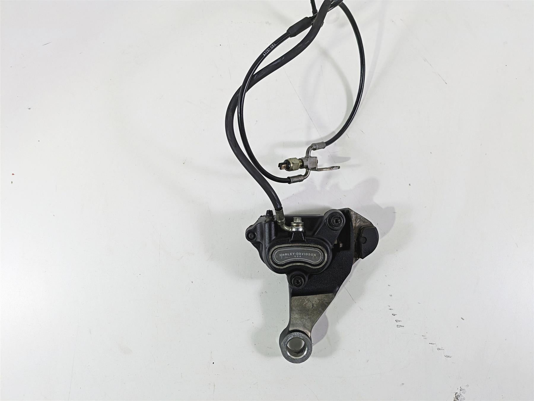 2008 Harley FLSTC Softail Heritage Rear Brake Caliper + Bracket & Line 40908-08 {{ shop.shopifyCountryName }} - Mototech271