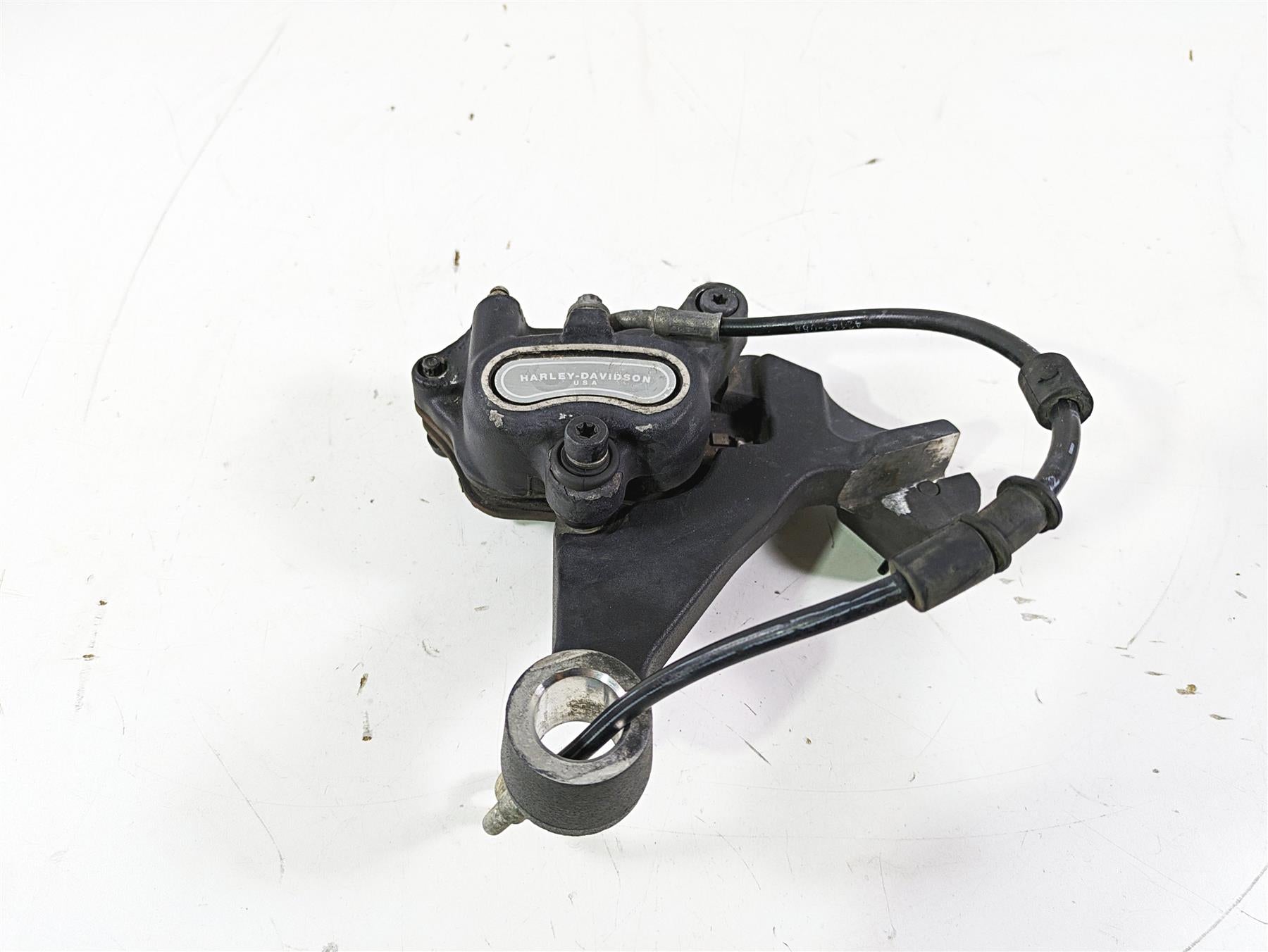 2012 Harley FLD Dyna Switchback Rear Brake Caliper & Bracket 40908
