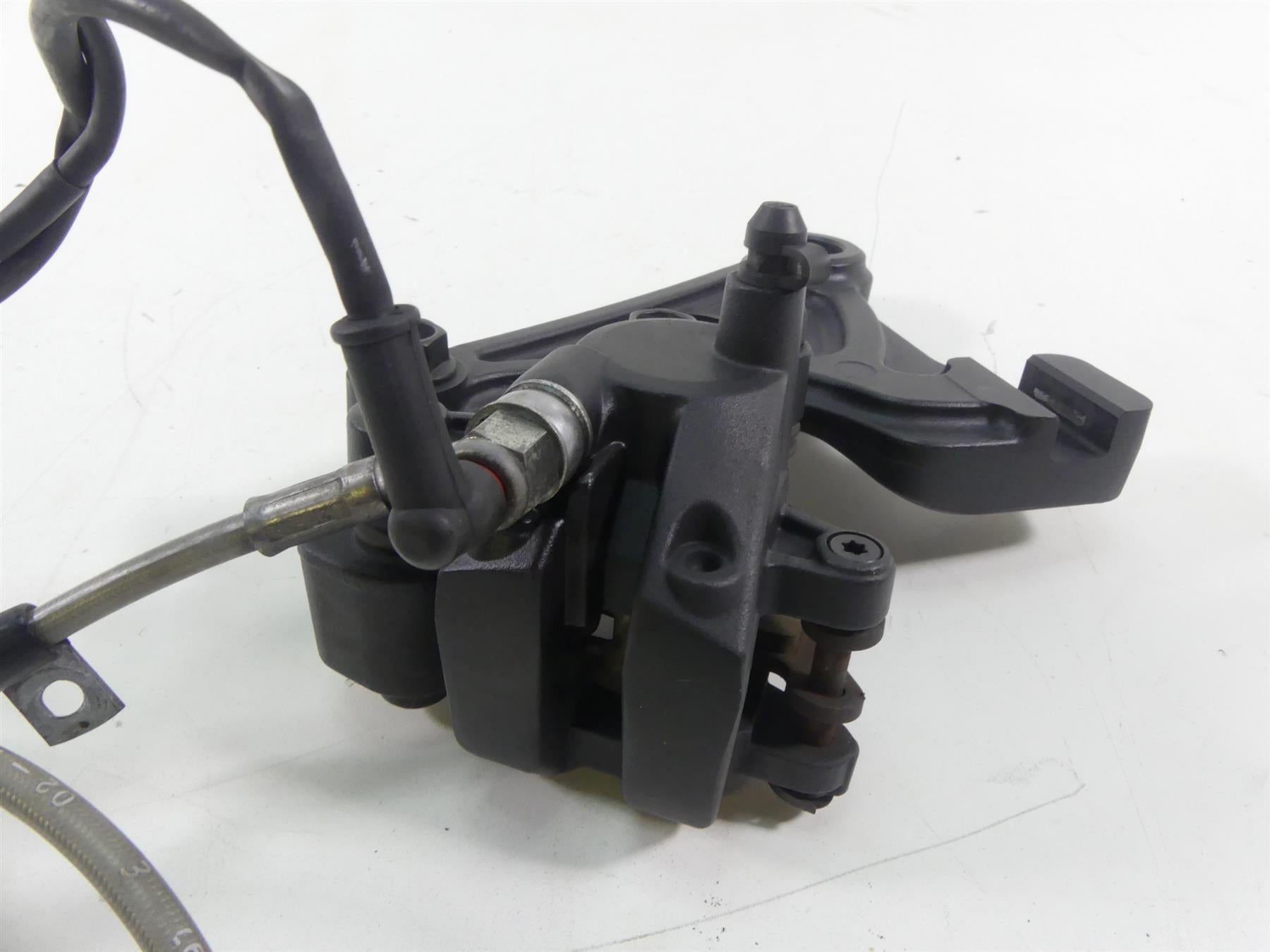 2017 Victory Octane 1200 Rear Brake Caliper + Line & Mount 1912701-468 {{ shop.shopifyCountryName }} - Mototech271