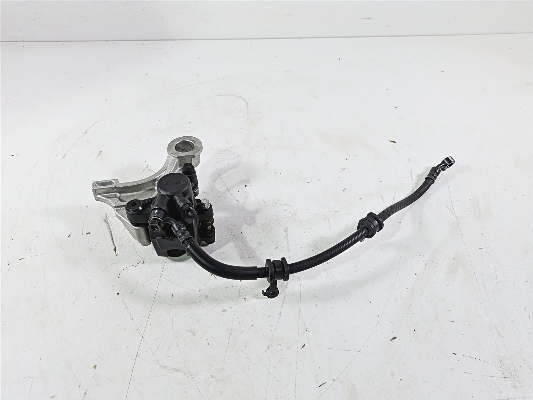2008 Honda CBR1000RR SC59 Nissin Rear Brake Caliper + Line 43150-MEL-D31 {{ shop.shopifyCountryName }} - Mototech271