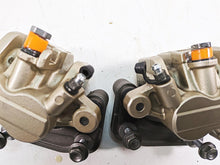 Load image into Gallery viewer, 2012 Triumph Tiger 800XC ABS Nissin Front Brake Caliper Set T2022030 T2022031
