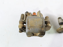 Load image into Gallery viewer, 2011 Can-Am Outlander 650 4X4 XT Front Brake Caliper Set 705600576 705600575
