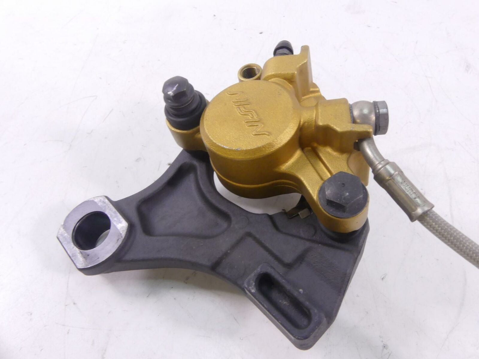 2009 Triumph Street Triple 675R Rear Nissin Brake Caliper + Mount T2307352 {{ shop.shopifyCountryName }} - Mototech271
