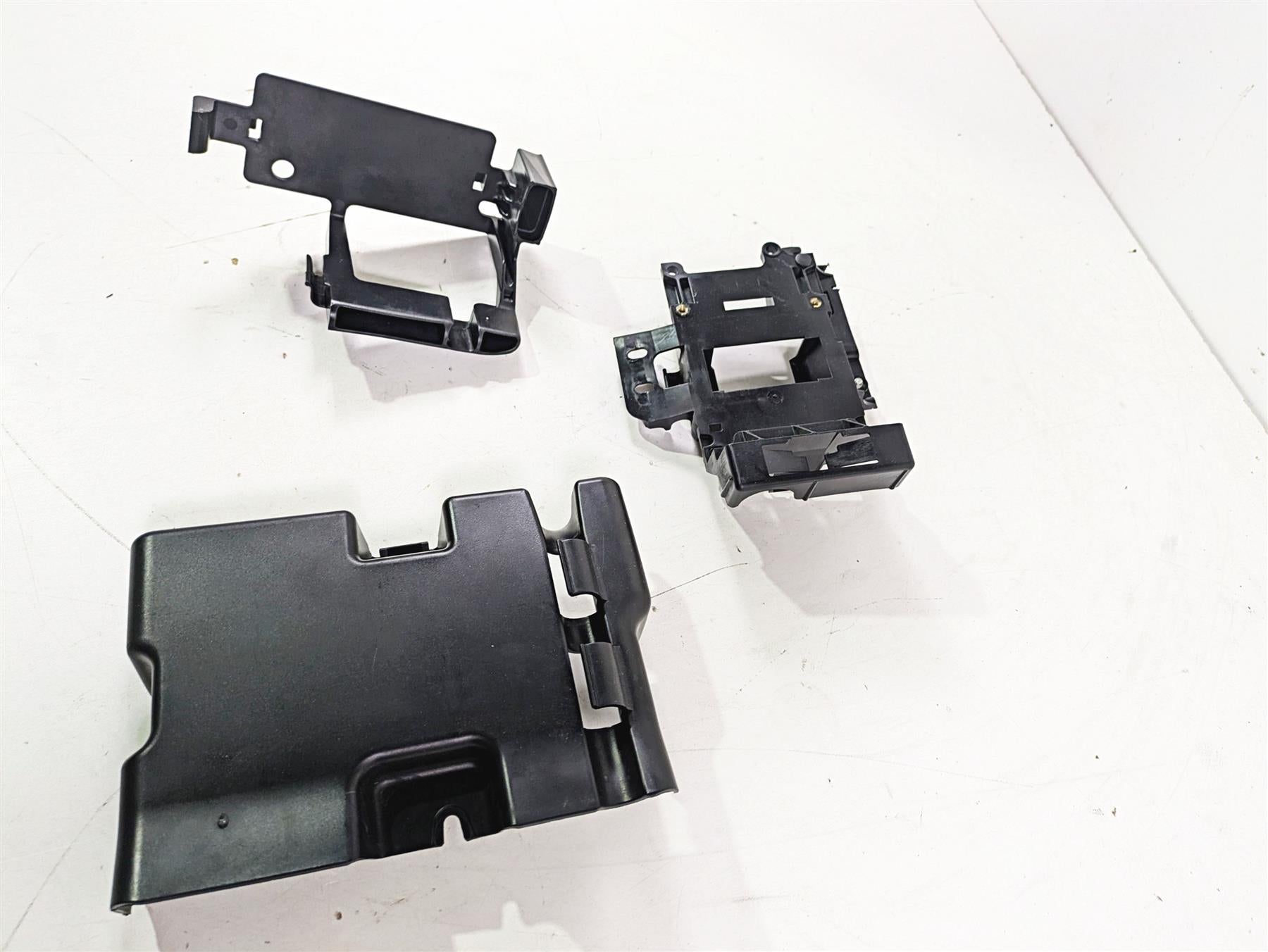 2009 Harley FXCWC Softail Rocker Electrical Carrier Holder Stay Set 70387-08 {{ shop.shopifyCountryName }} - Mototech271