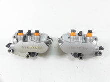 Load image into Gallery viewer, 2009 Victory Vision Tour Front Brake Caliper Set 1910924 1911510 1910925 1911511 | Mototech271
