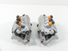 Load image into Gallery viewer, 2009 Victory Vision Tour Front Brake Caliper Set 1910924 1911510 1910925 1911511 | Mototech271
